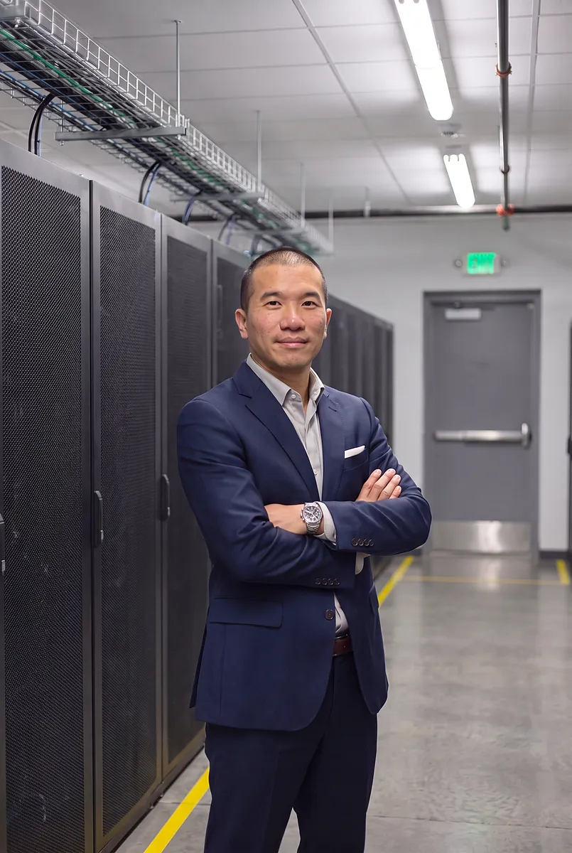 Jimmy Lin standing in a data center